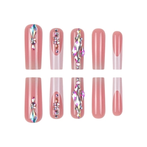 White French tip press-on nails with colorful rhinestones on long ballerina fake nails