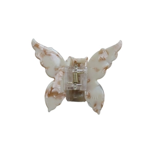 Elegant tortoiseshell acetate butterfly hair claw clip with cream marble texture