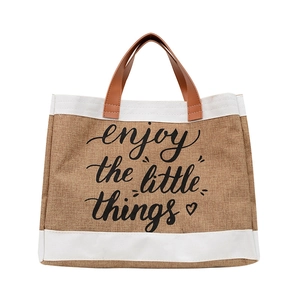 Minimalist linen tote bag with brown leather handles and enjoy the little things print