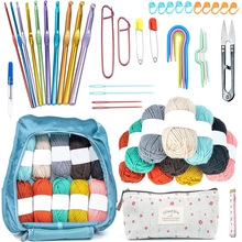 Complete knitting kit with hooks, colorful yarn, measuring tape and blue storage bags