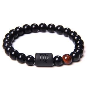 Detail van Virgo sterrenbeeld kralenarmband met zwarte onyx en tijgeroog stenen