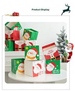 Macro shot of square Christmas gift bags with Santa patterns and festive Merry Christmas text