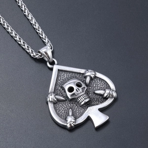 Retro punk skull and spade pendant in distressed stainless steel on woven chain