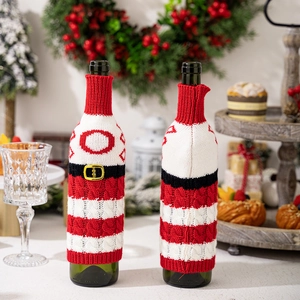 Christmas knit wine bottle cover set, red and white striped holiday table decoration.