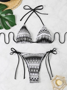 Close-up of crochet knit texture and geometric pattern on a two-piece bikini set