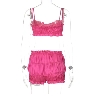 Detailed back view of rose red satin two-piece set featuring pleated tube top and shorts