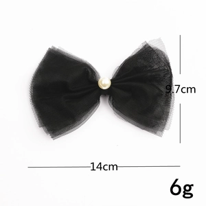 Detail view of black lace bow hair clip with pearl showing 14cm x 9.7cm dimensions
