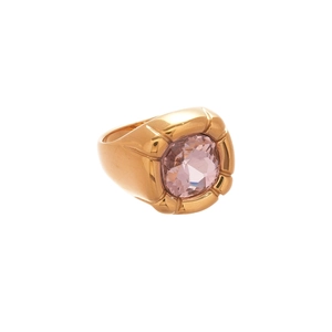 Vintage gold-plated ring featuring an oval pink gemstone and thick geometric band