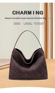 Detail of the high-quality hand-woven leather texture on this large brown hobo tote bag