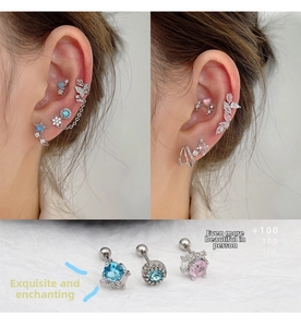 Detail view of colorful zircon butterfly and star stainless steel stud earring set