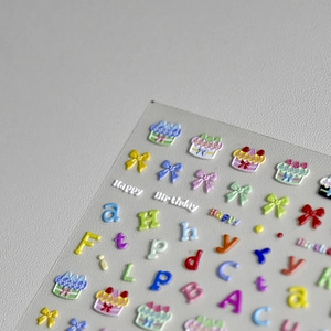3D embossed nail art stickers with colorful Happy Birthday patterns and cute bow designs