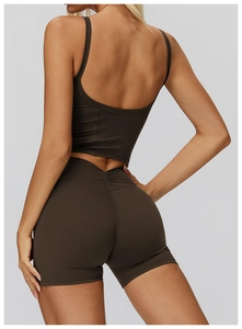 Set da yoga marrone scuro con top schiena scoperta e pantaloncini push-up sportivi