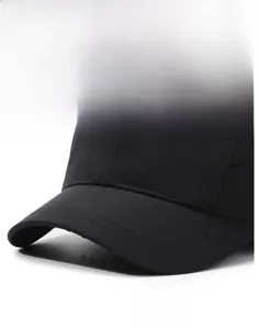 Close-up of black ripstop fabric texture and curved brim on a sports baseball cap