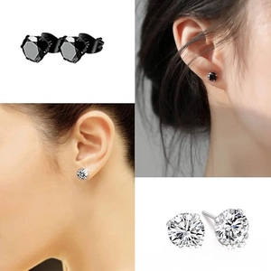 Detail view of square cubic zirconia stud earrings set in black and silver finishes