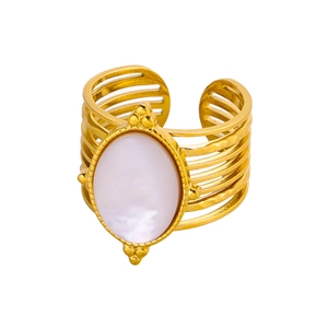 Detailed shot of vintage gold open ring featuring a large oval white shell gemstone inlay