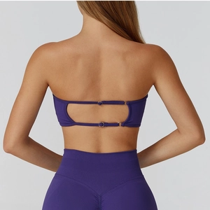 Purple seamless yoga set with buckle sports bra and high-waisted leggings back view