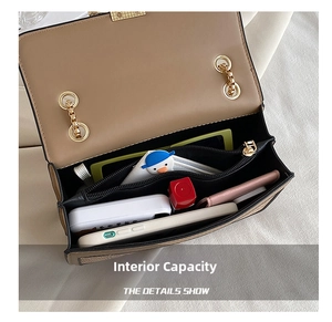 Top view of beige crossbody bag showing multi-layer interior capacity with essentials