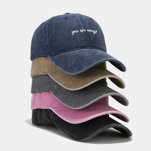 Washed cotton baseball caps with 'you are enough' embroidery in multiple vintage colors