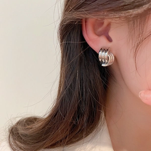 Elegant silver twisted multi-loop hoop earrings for women in a minimalist fashion style