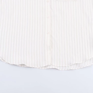 Modern vertical stripe shirt with pale pink buttons and a rounded hemline detail