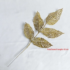 Detail of 42cm gold glitter hollow leaves for Christmas and wedding festive decorations