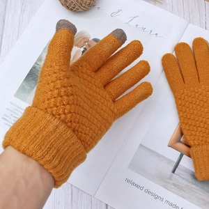 Winter knitted touchscreen gloves in ginger yellow with diamond pattern for warm outdoor use