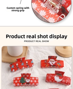 Detail of red Christmas hair claw clips with snowflakes and Santa Claus patterns