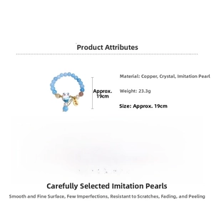 Macro detail of Maneki Neko pearl bracelet showing light blue beads and 19cm size chart