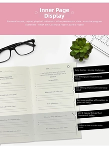 Detail view of A5 linen gratitude journal pages showing daily quotes and goal tracking