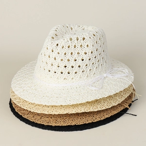 Detailed stack of hollow knit boho straw hats in white, beige, khaki and black colors