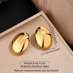 Detail view of gold stainless steel oval earrings with dimensions and weight specs