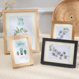 Minimalist solid wood picture frame set in natural and black finishes for home wall decor