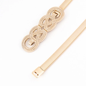 Detailed close-up of golden elastic metal waist chain with vintage woven twist buckle