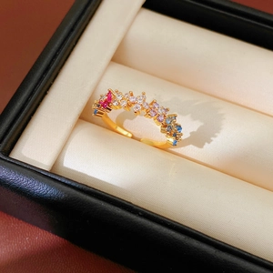 Detailed close-up of colorful zircon cluster inlay on adjustable 18k gold plated ring