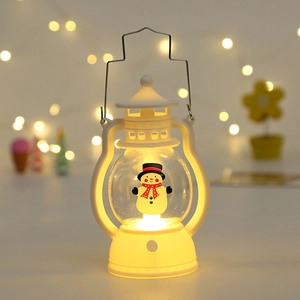 Close-up of a white vintage Christmas lantern featuring a snowman with a cozy red scarf