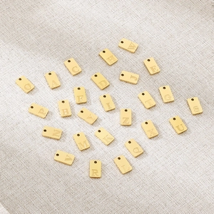 Set of 24 rectangular gold stainless steel alphabet letter pendants for DIY jewelry