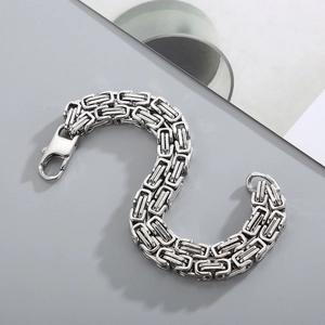 Detailed macro view of Byzantine stainless steel double layer chain bracelet with lobster clasp