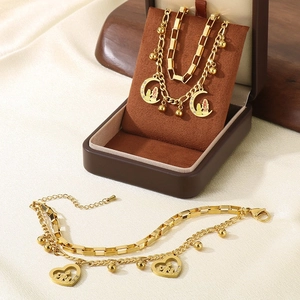 Golden double-layer moon and heart charm jewelry set with hollow family figures