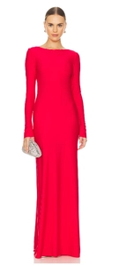 Detail of the elegant red long sleeve backless maxi dress with a slim fit and floor-length hem