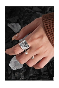 Detail of S925 sterling silver textured wide ring and double bead open ring set
