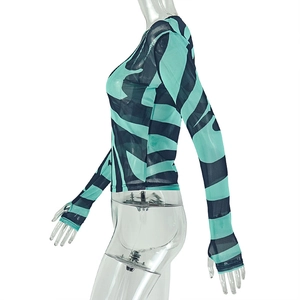 Detail of blue zebra print mesh top with thumbhole sleeves on a mannequin
