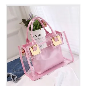 Pink transparent PVC jelly beach bag with inner pouch and gold square lock hardware