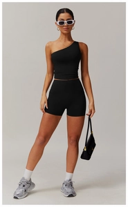 Athleisure style black one-shoulder yoga vest and high-waist cycling shorts set detail