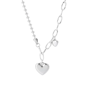 Minimalist silver asymmetric necklace featuring dual heart pendants on a mixed chain