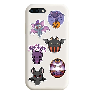 Detail of Halloween bat and pumpkin stickers applied on a white mobile phone case