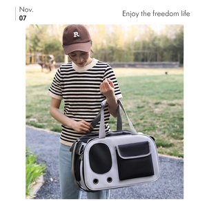 Outdoor lifestyle shot of a large breathable pet carrier bag with mesh side detail