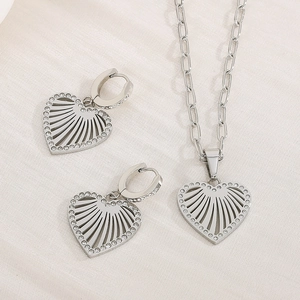 Polished silver heart jewelry set with cutout fan design and sparkling crystals