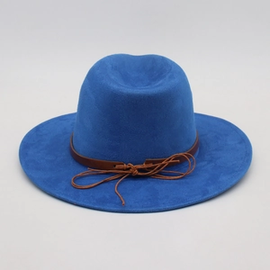 Detail of navy blue fedora hat featuring a brown leather band and retro rope knot design