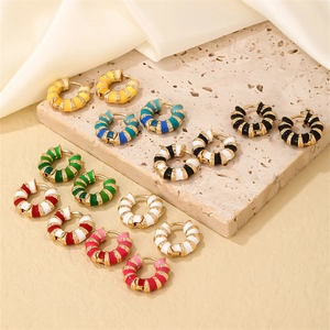 Retro colorful enamel hoop earrings with gold base on stone tray for fall fashion