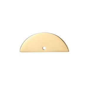 Detail of a polished gold semi-circle pendant charm with a central hanging hole